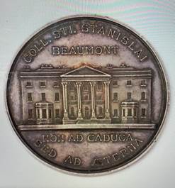 A coin with a building on it

Description automatically generated