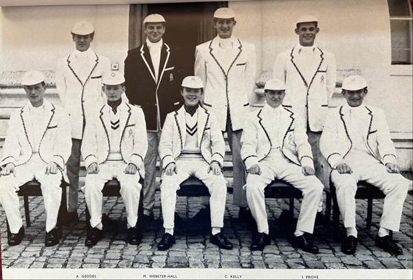 A group of men in white uniforms

Description automatically generated